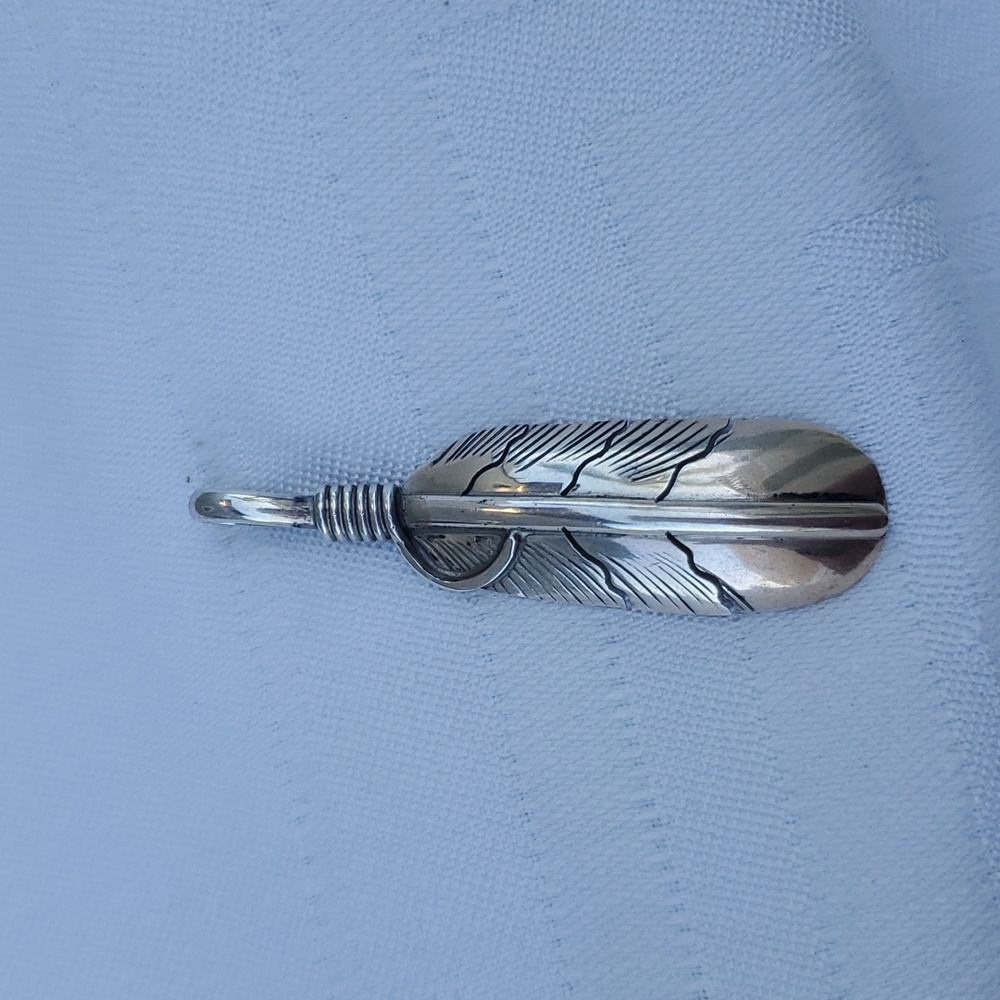 Sterling silver feather pendant